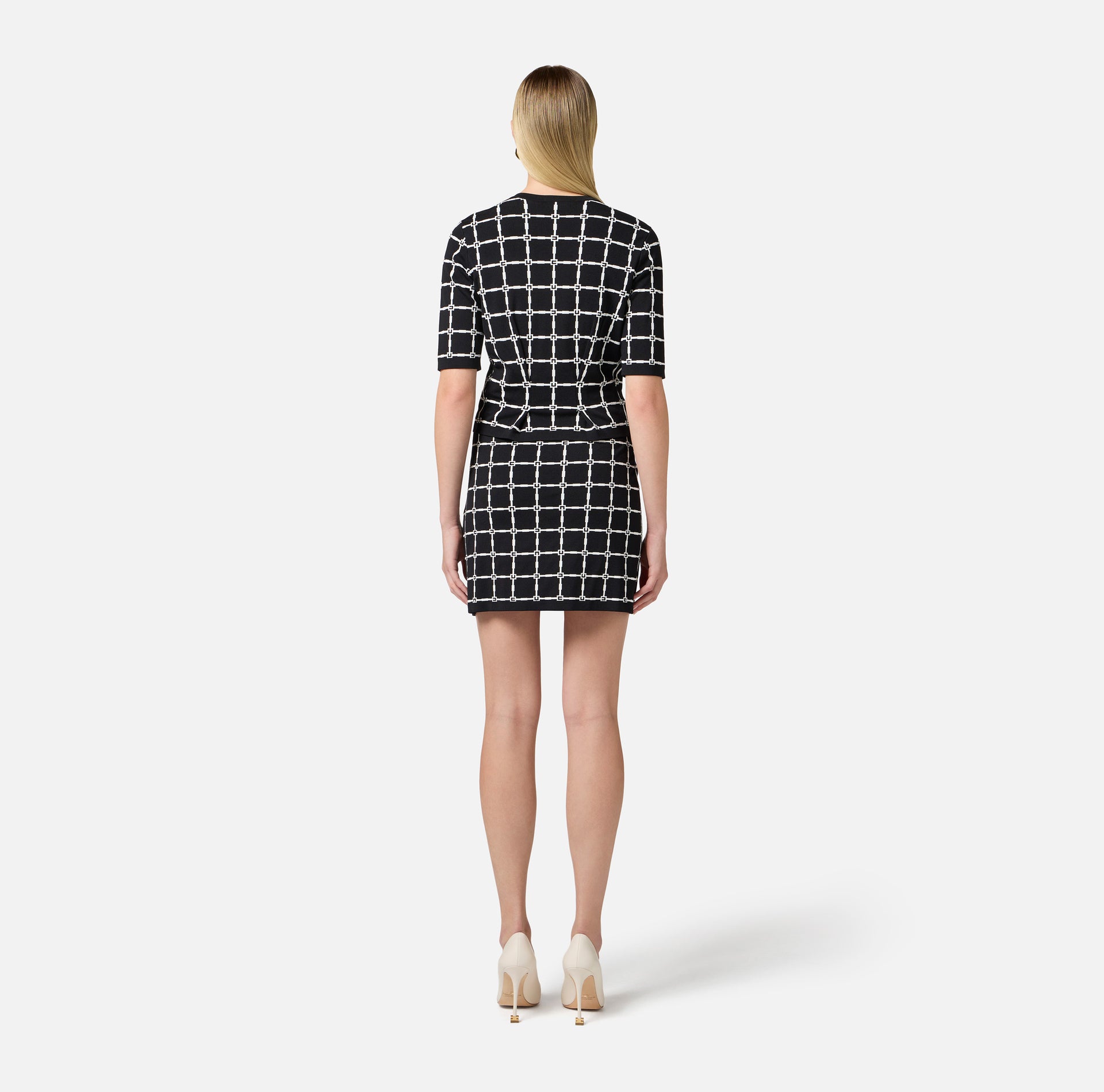 Minigonna in jacquard logo con bottoni dorati