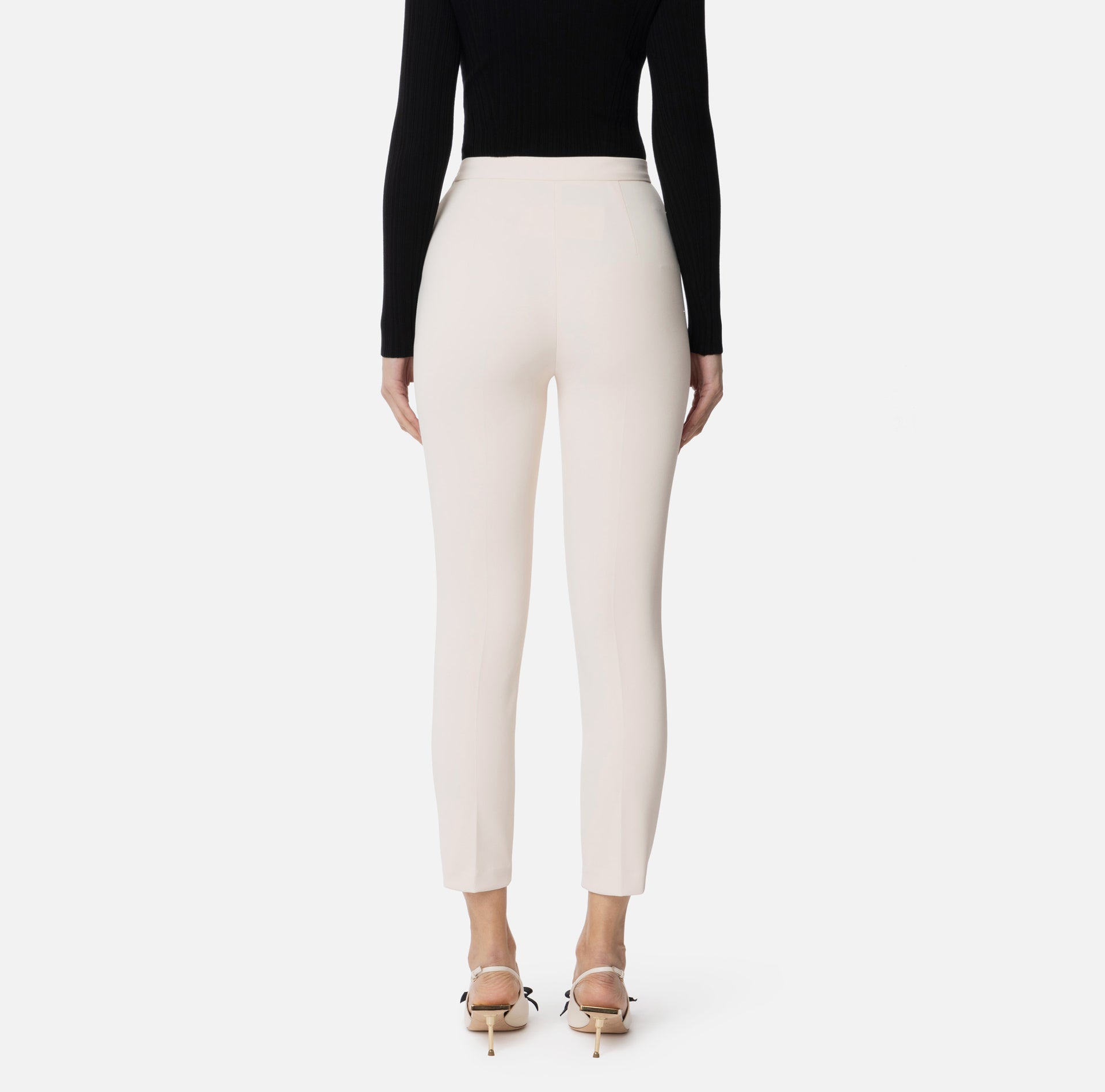 Pantaloni slim in crêpe con placca logo