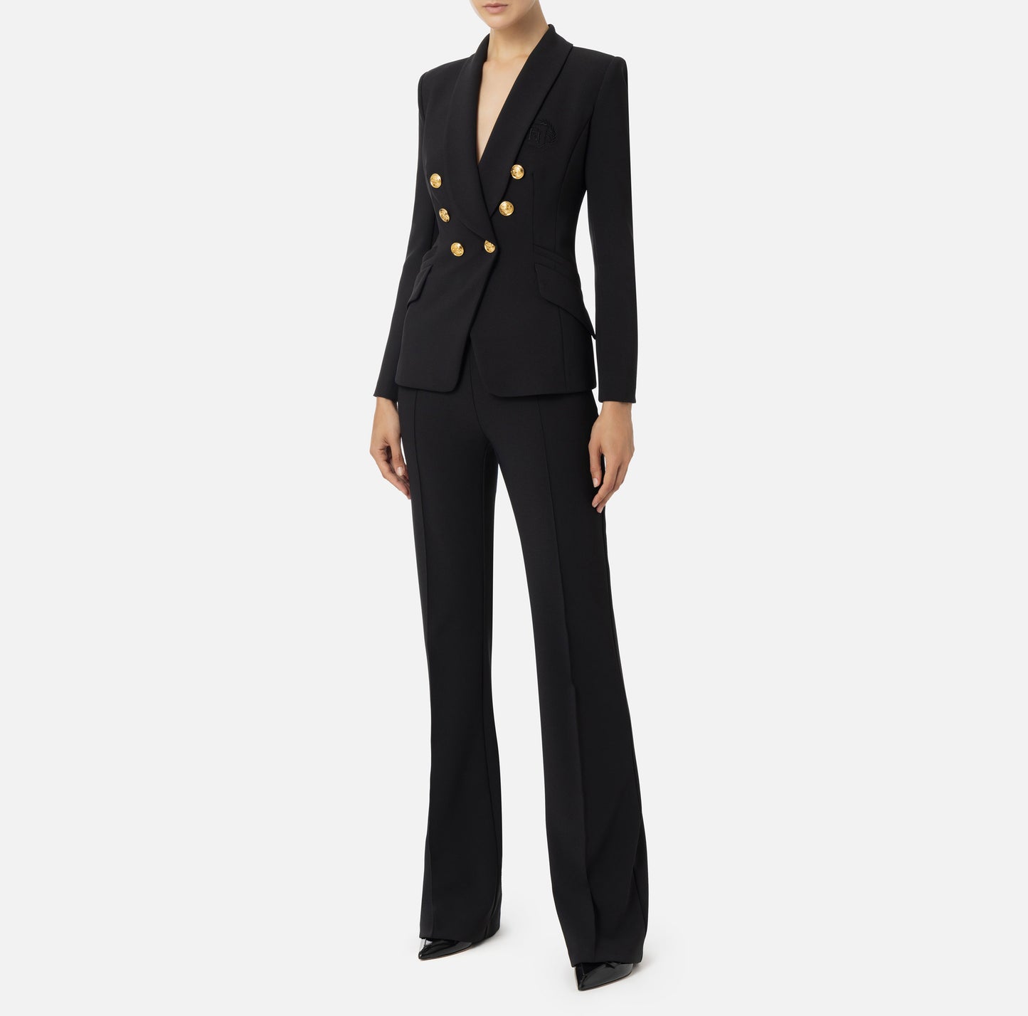 Tailleur in doppio crêpe stretch con giacca sciallata e pantalone a palazzo